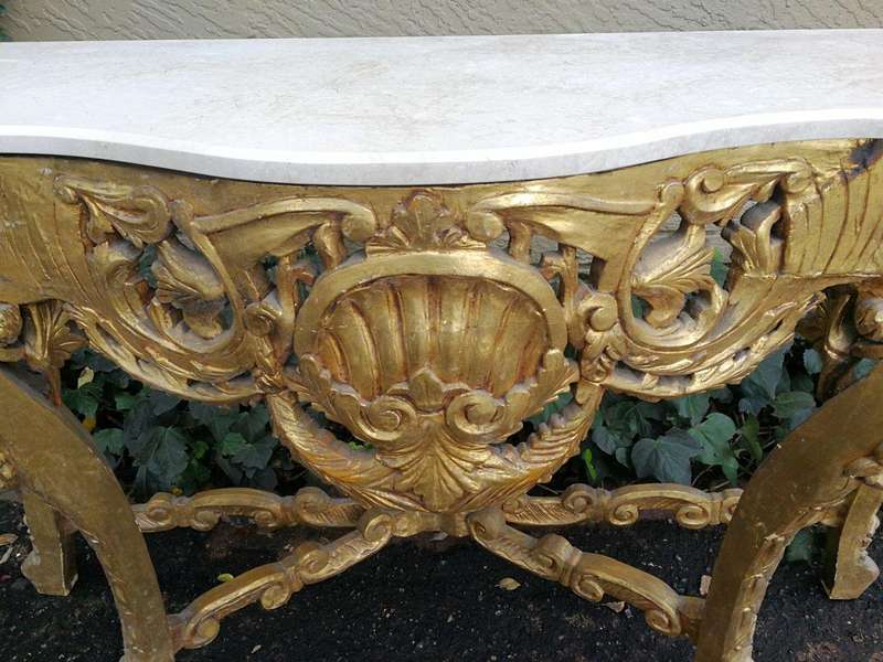 A French Rococo Style Ornately Carved Marble top Console Table