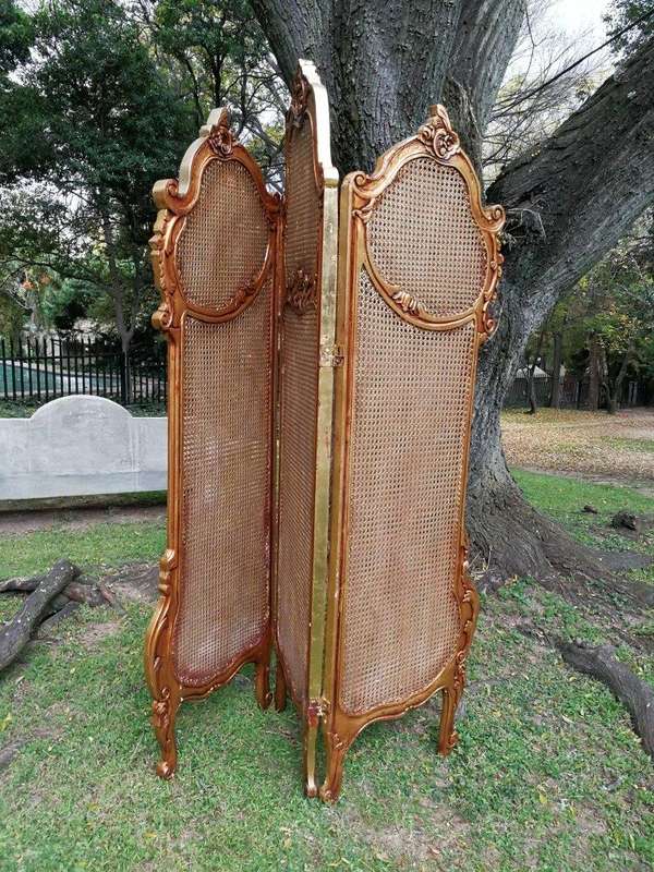 A 2Oth Century French Rococo Style Ornately Carved and Gilded Rattan Screen