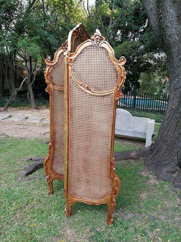 A 2Oth Century French Rococo Style Ornately Carved and Gilded Rattan Screen