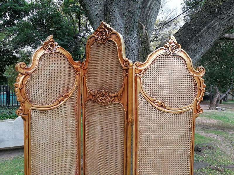 A 2Oth Century French Rococo Style Ornately Carved and Gilded Rattan Screen