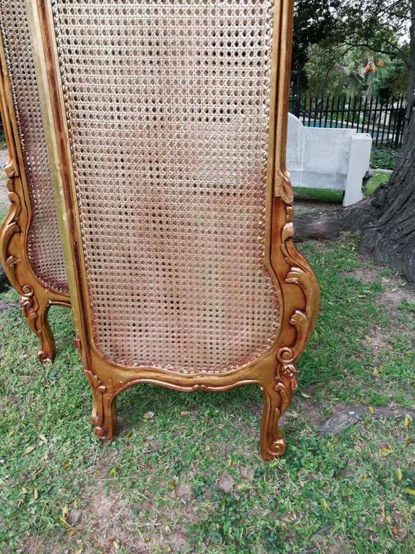 A 2Oth Century French Rococo Style Ornately Carved and Gilded Rattan Screen