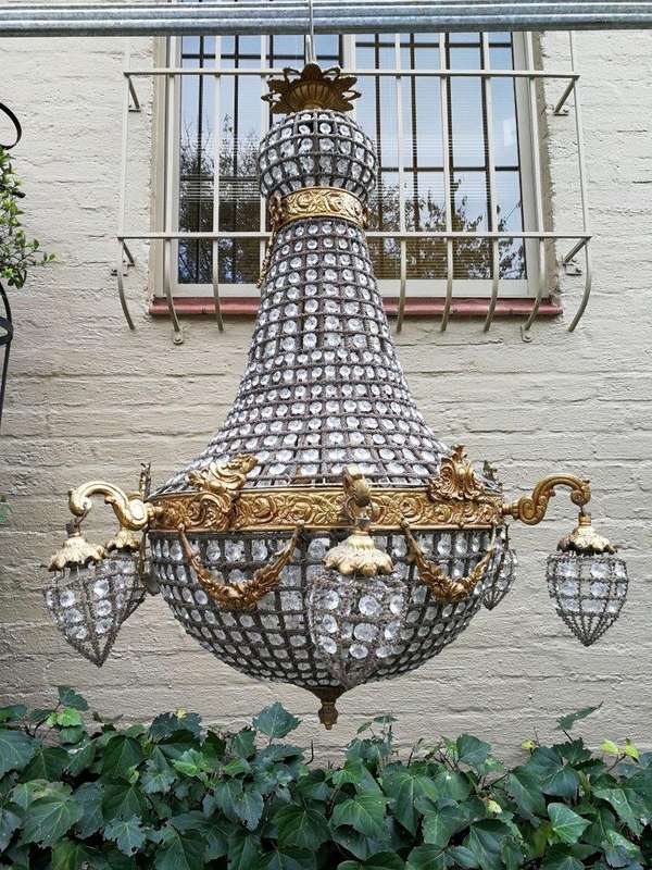 A French Empire Style Brass and Gilt Chandelier