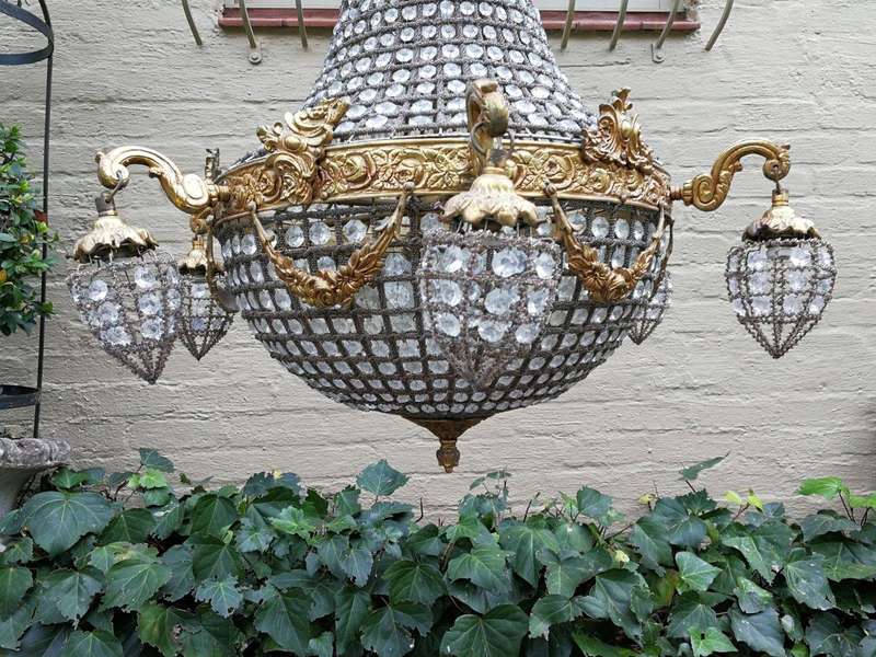 A French Empire Style Brass and Gilt Chandelier