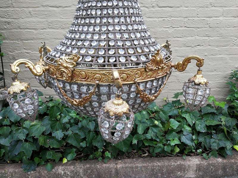A French Empire Style Brass and Gilt Chandelier