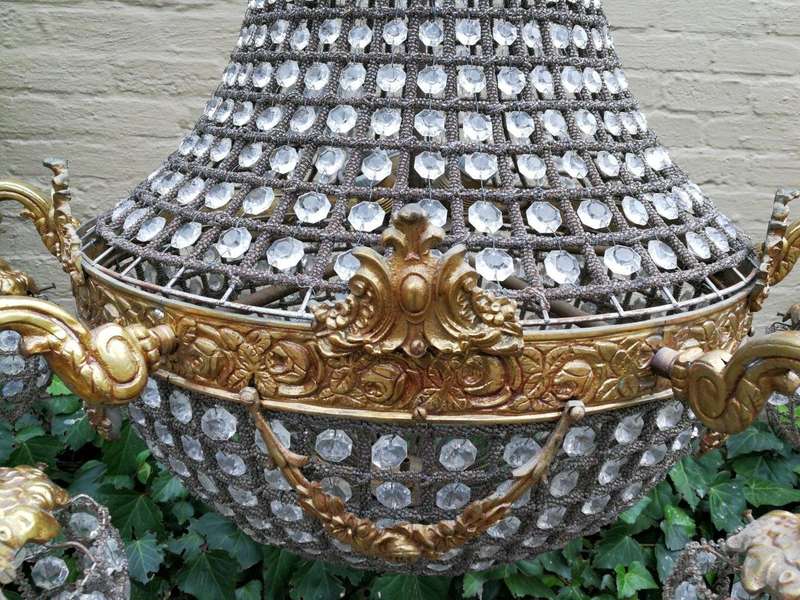 A French Empire Style Brass and Gilt Chandelier