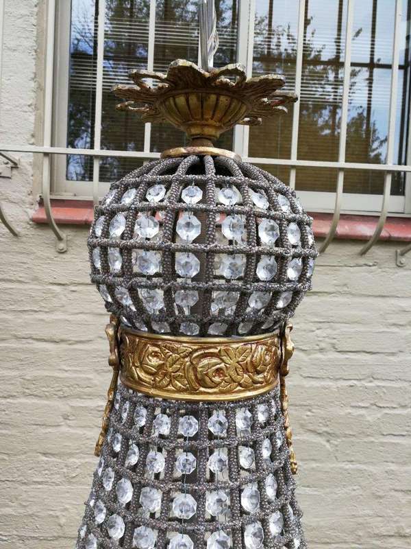 A French Empire Style Brass and Gilt Chandelier