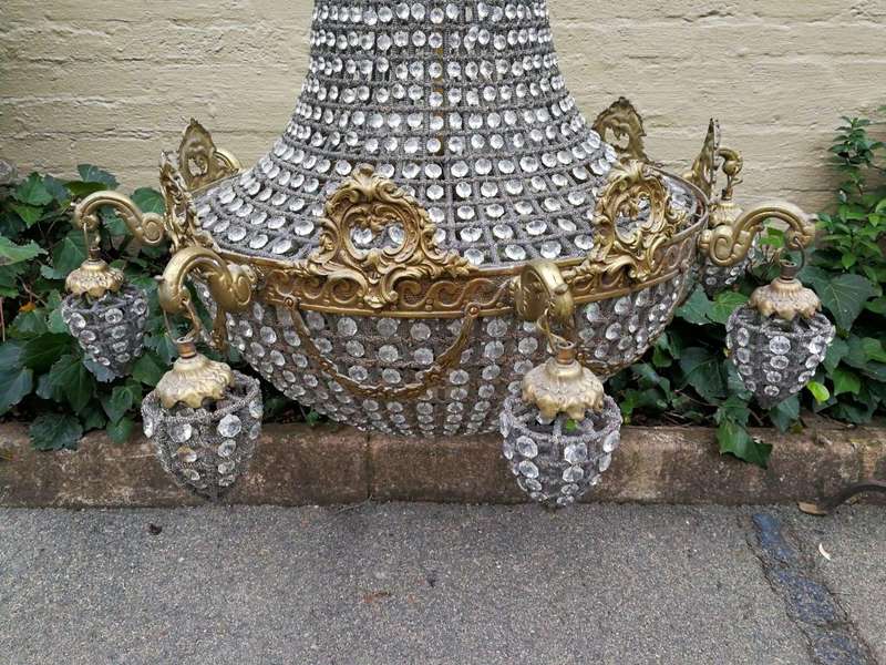 A French Empire Style Brass Gilt Chandelier