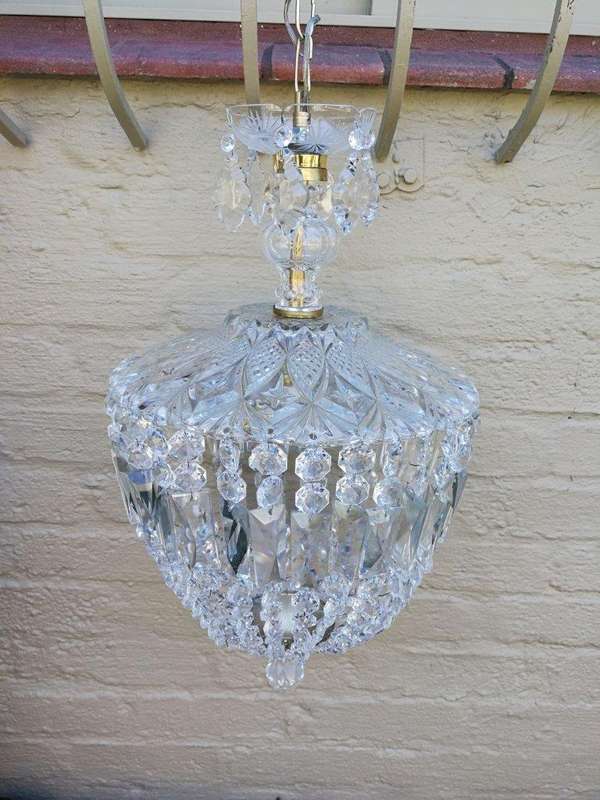 A French Style Brass and Crystal Plate Chandelier with Floral top