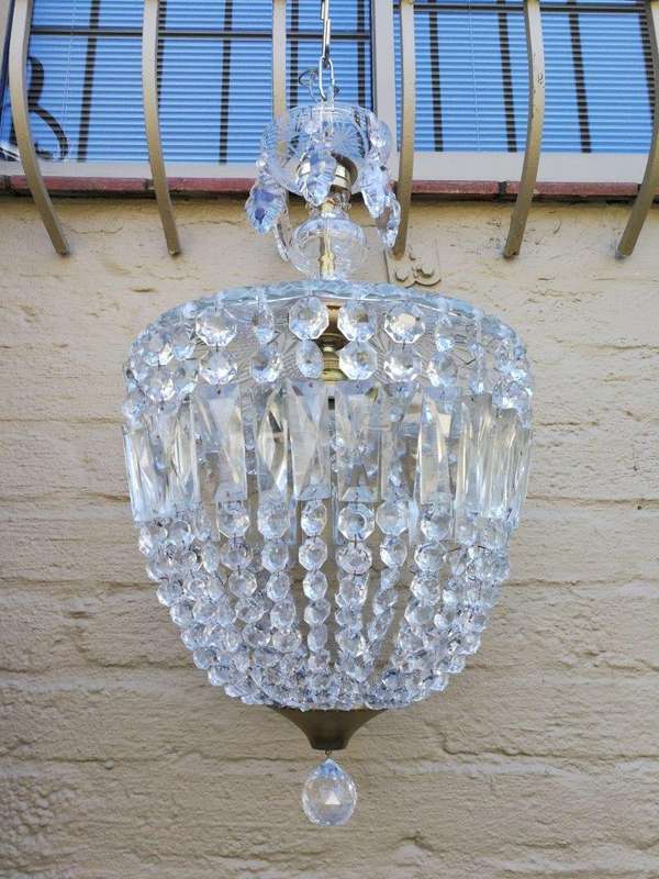 A French Style Brass and Crystal Plate Chandelier with Floral top