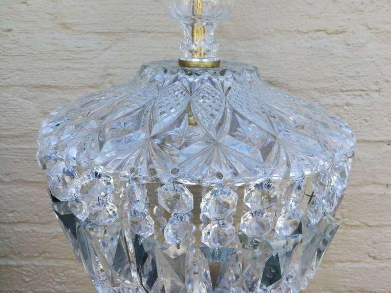 A French Style Brass and Crystal Plate Chandelier with Floral top