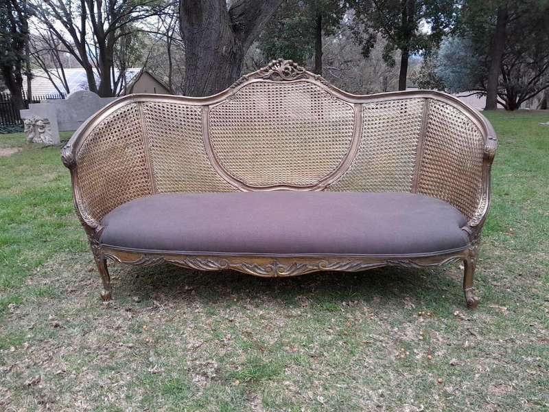 A Gilded Rattan Back Settee