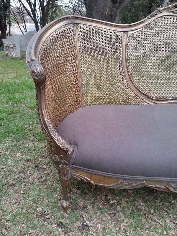 A Gilded Rattan Back Settee