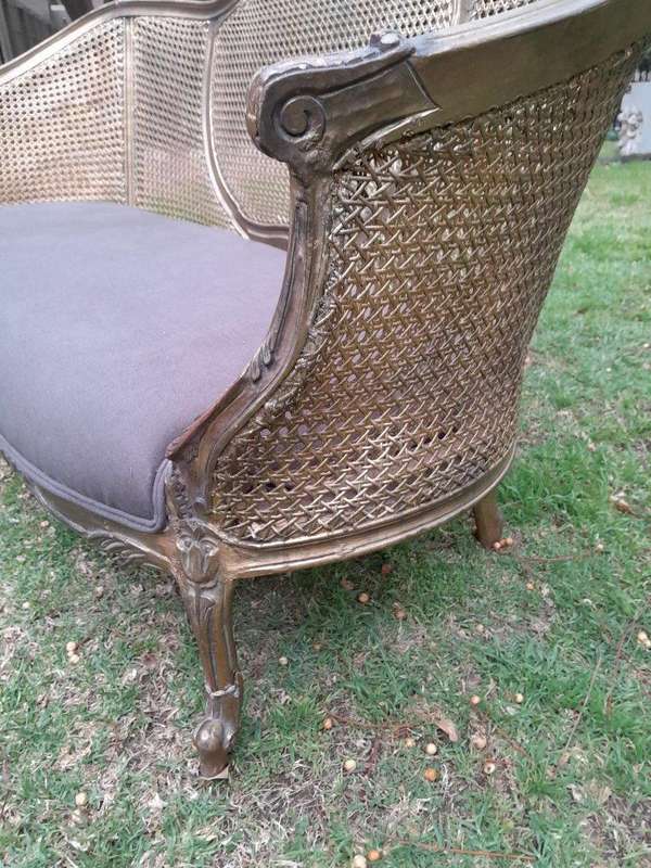 A Gilded Rattan Back Settee