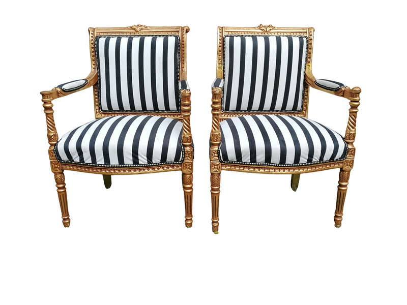 A Pair Of Louis XVI Style Carved And Gilded Armchairs