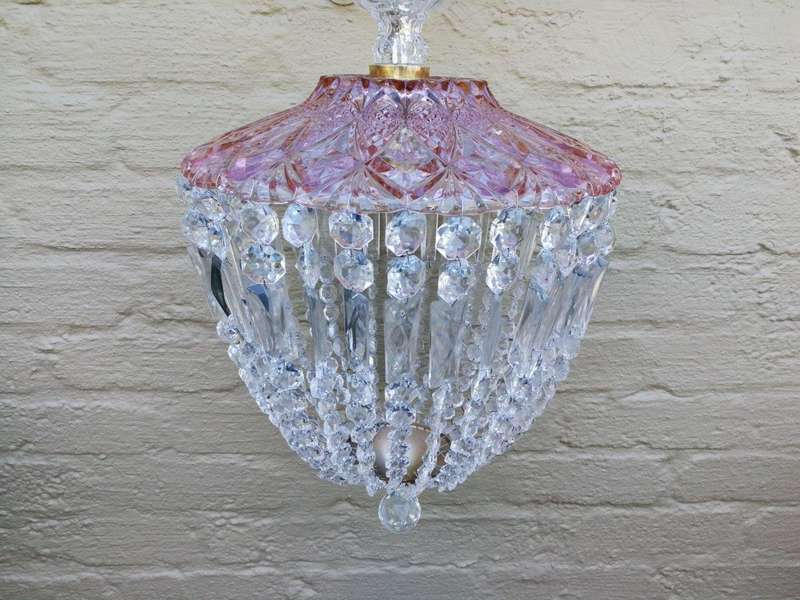 A French Style Brass and Crystal Plate Chandelier with a Floral Cerise Top