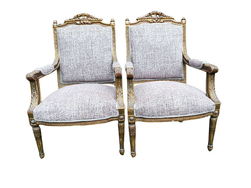 A Pair Of French Style Giltwood Ornate Arm Chairs On Fluted Legs