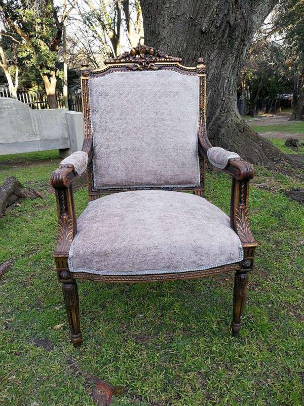 A Pair of French Style Giltwood Ornate Arm Chairs on Fluted legs 