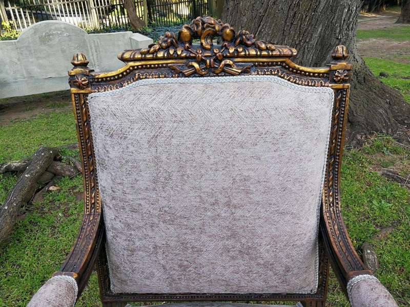 A Pair of French Style Giltwood Ornate Arm Chairs on Fluted legs 