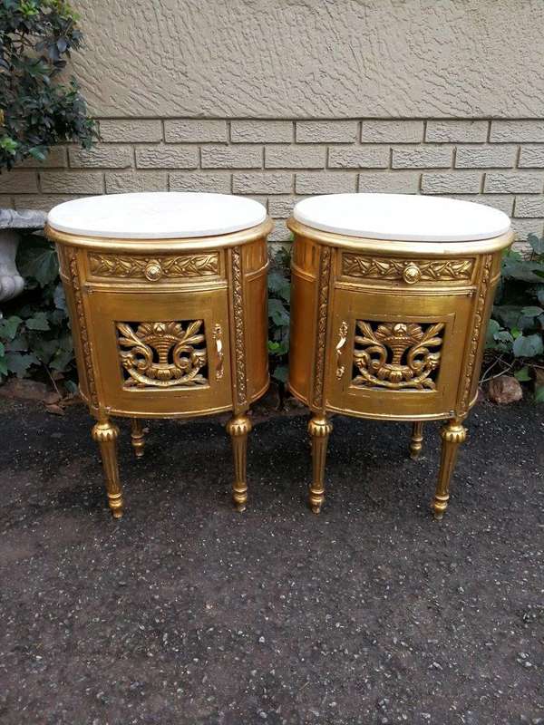 A Pair of French Style Ornately Carved Giltwood Pedestals/Side Tables with Marble Tops