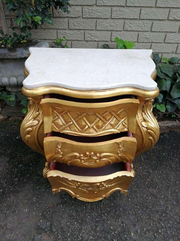 A Pair of French Style Ornately Carved Bombe Giltwood Pedestals/Side Tables with Marble Tops