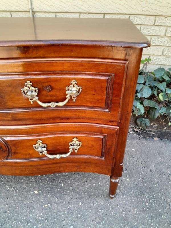 An Extremely Rare 18th Century French Provincial Fruitwood Chest of Drawers with Original Brass H...