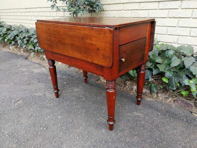 An Antique 19h Century Burmese Teak Drop-Side Table With Drawer