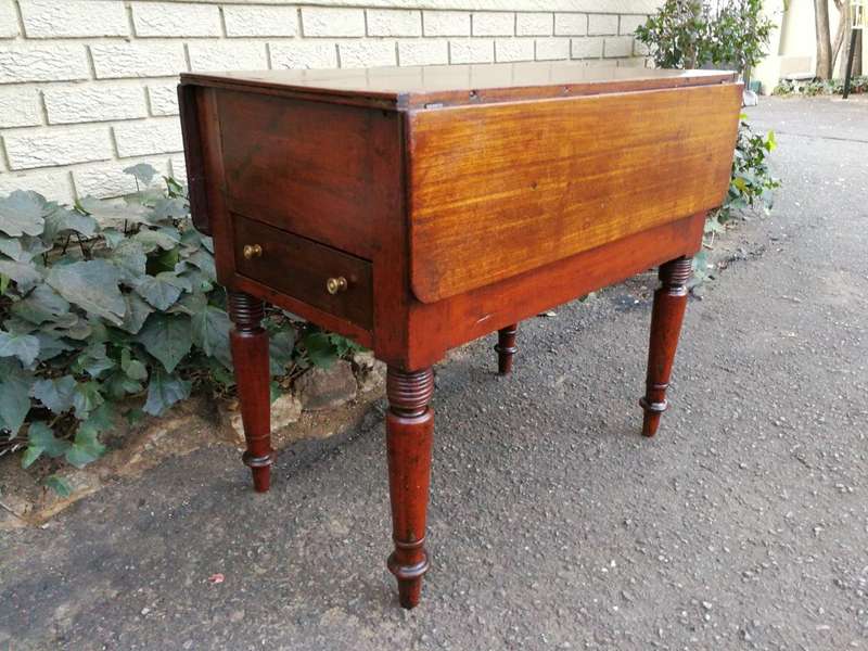 An Antique 19h Century Burmese Teak Drop-Side Table With Drawer