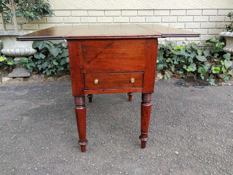 An Antique 19h Century Burmese Teak Drop-Side Table With Drawer
