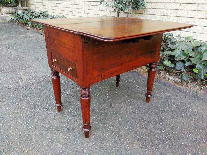An Antique 19h Century Burmese Teak Drop-Side Table With Drawer