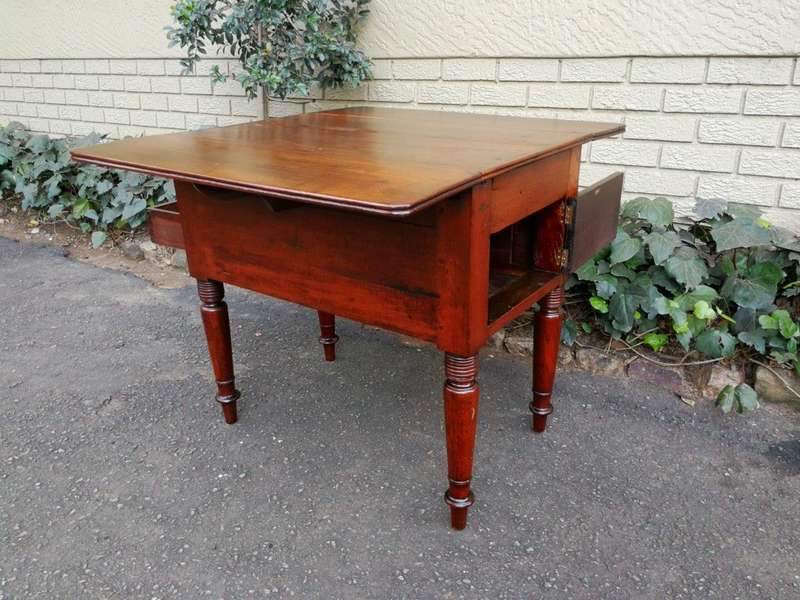 An Antique 19h Century Burmese Teak Drop-Side Table With Drawer