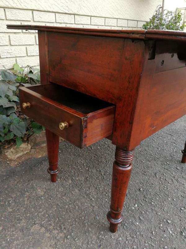An Antique 19h Century Burmese Teak Drop-Side Table With Drawer