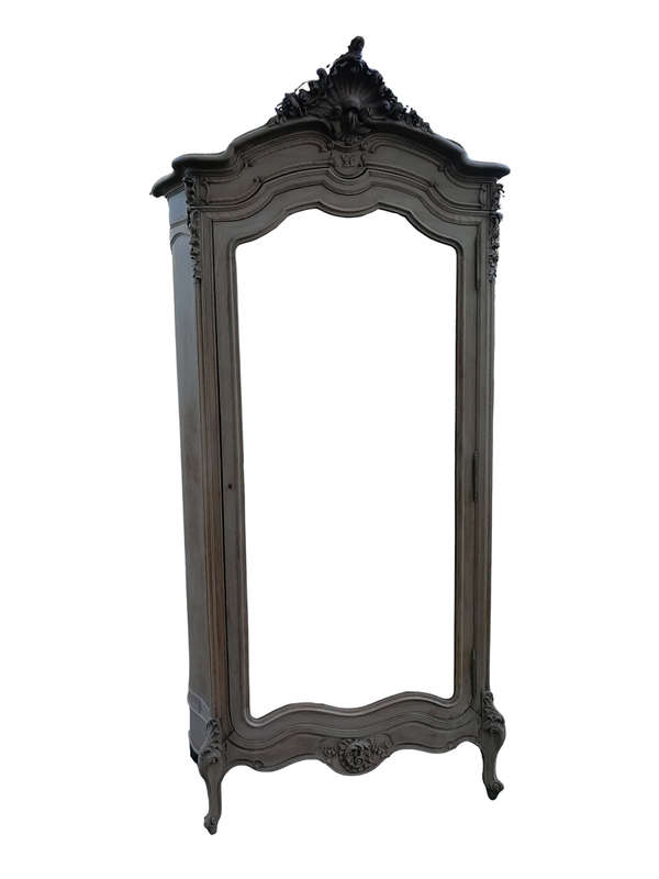 An Early 20th Century French-Style Carved Mahogany And Bevelled Mirrored Armoire in a Contemporar...