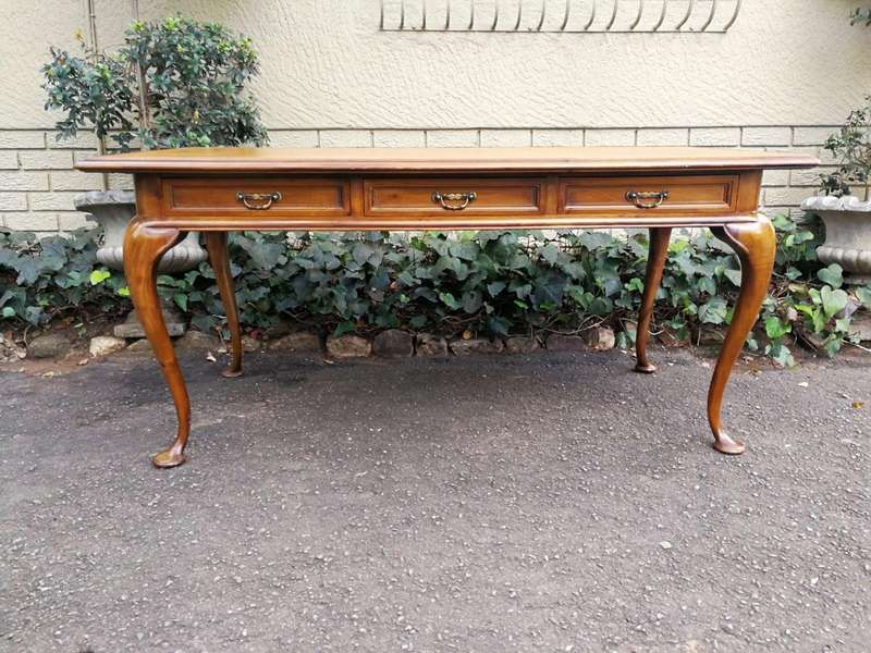 A 20th Century Victorian-Style Blonde Mahogany Desk With Leather And Gilt Tooling And Three Drawe...