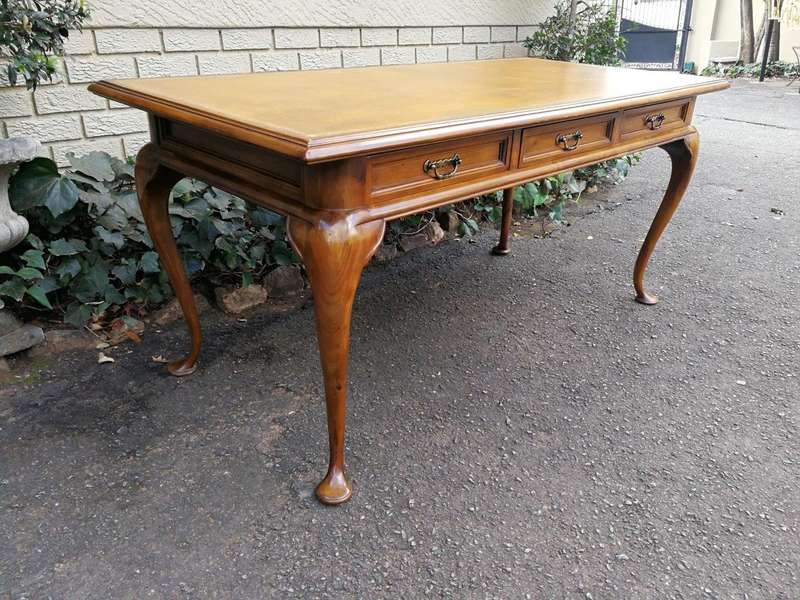 A 20th Century Victorian-Style Blonde Mahogany Desk With Leather And Gilt Tooling And Three Drawe...