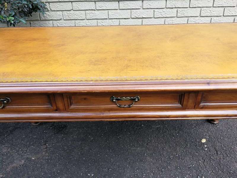 A 20th Century Victorian-Style Blonde Mahogany Desk With Leather And Gilt Tooling And Three Drawe...