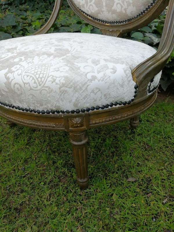 A Rare Pair of 18th Century French Gilt-wood Chairs