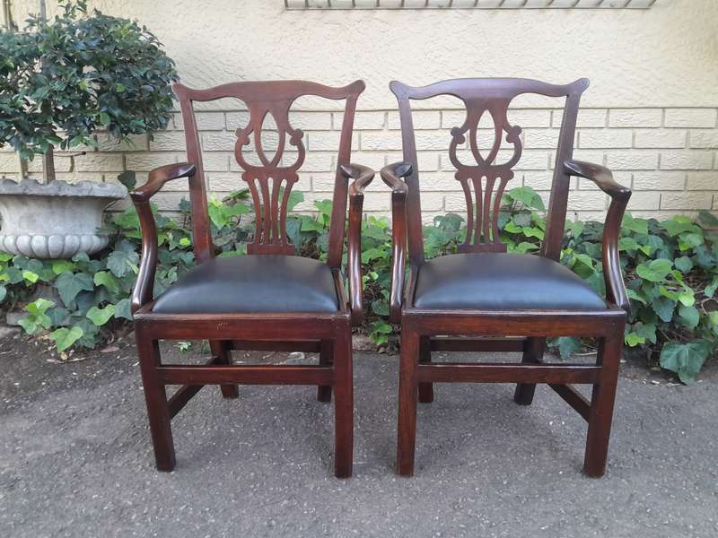 A 19th Century / Circa 1810 Victorian Pair of Carved Oak Armchairs Upholstered in Leather
