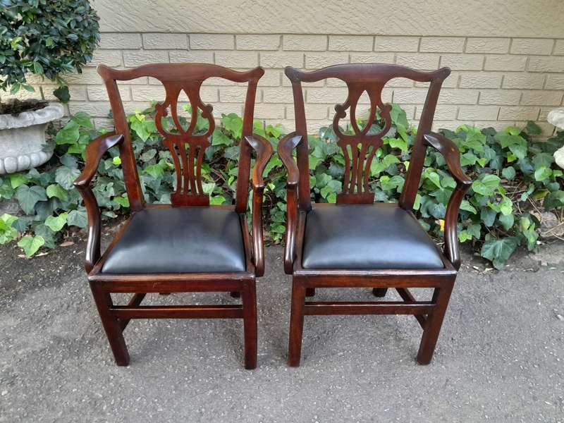 A 19th Century / Circa 1810 Victorian Pair of Carved Oak Armchairs Upholstered in Leather