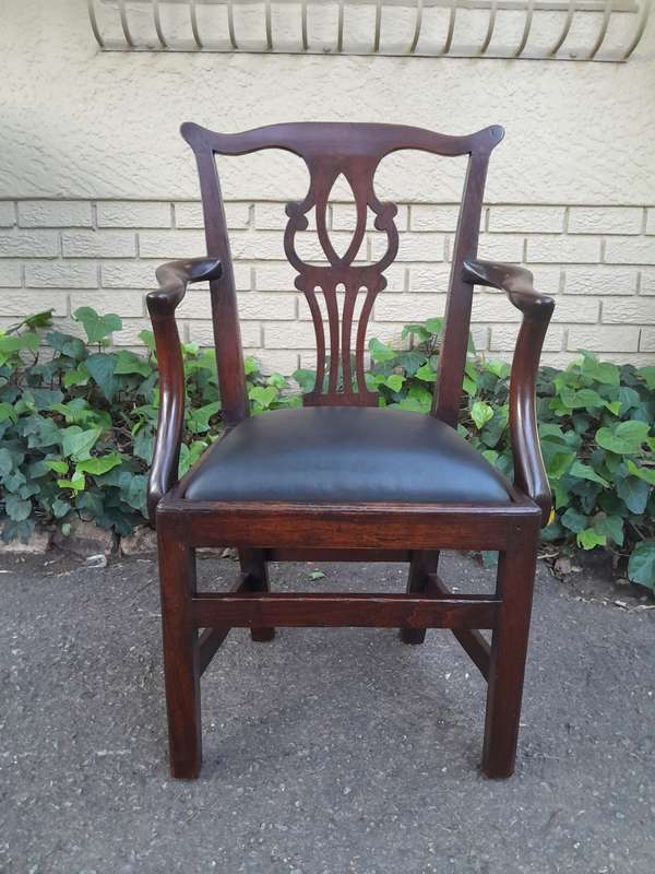 A 19th Century / Circa 1810 Victorian Pair of Carved Oak Armchairs Upholstered in Leather