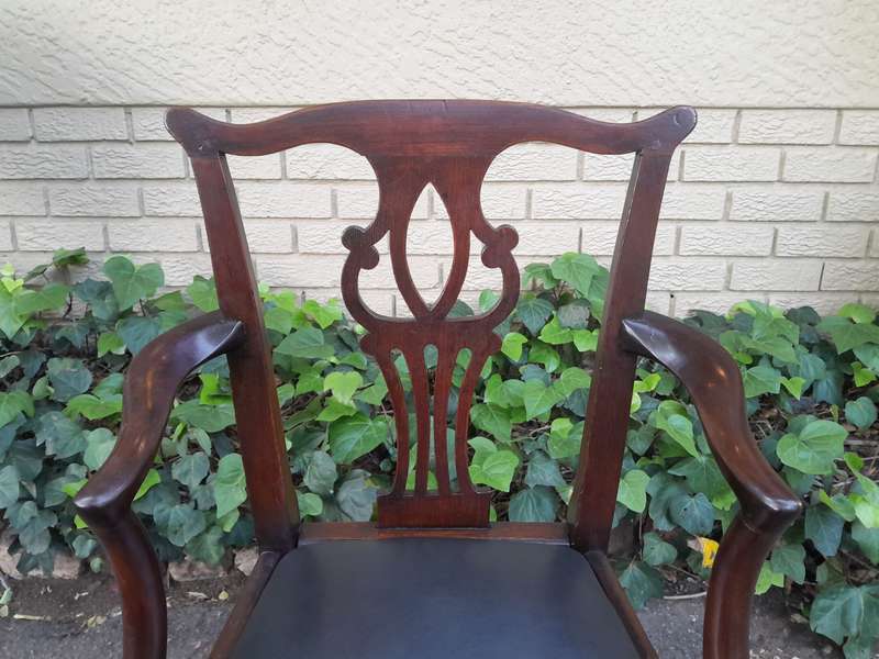 A 19th Century / Circa 1810 Victorian Pair of Carved Oak Armchairs Upholstered in Leather
