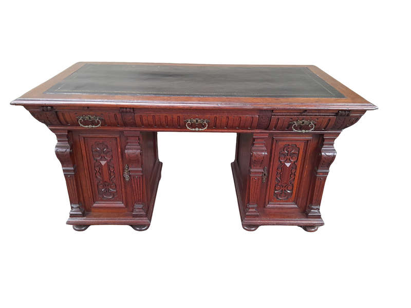 An Antique 19th Century Oak Carved and Ebonised Desk with Three Drawers and Two Pedestals with To...