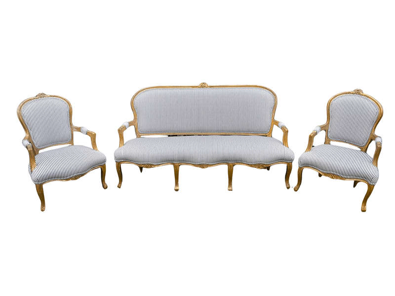 A 20TH Century French-style Carved and Giltwood Settee and a Pair of Armchairs upholsterd in a Co...