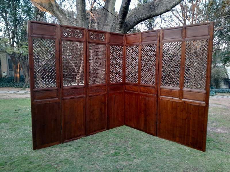 A First Half 20th Century Pair Of Double Chinese Elmwood Screen Panels (Two pairs available)