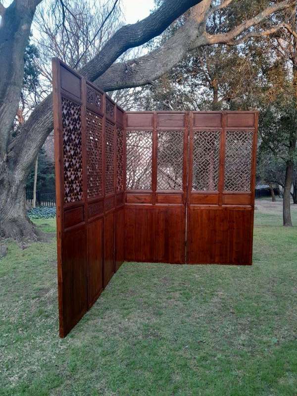A First Half 20th Century Pair Of Double Chinese Elmwood Screen Panels (Two pairs available)