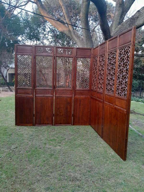 A First Half 20th Century Pair Of Double Chinese Elmwood Screen Panels (Two pairs available)