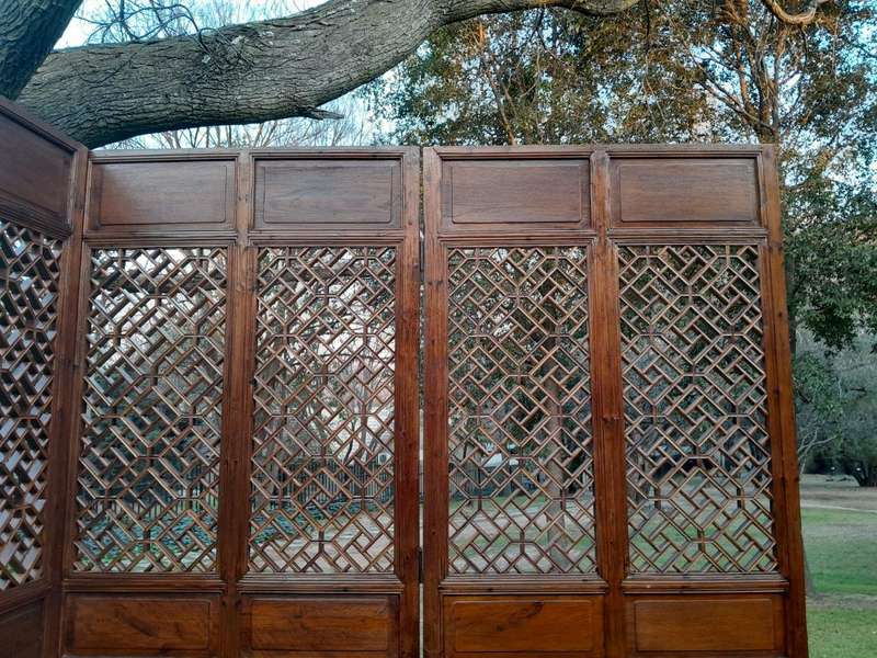 A First Half 20th Century Pair Of Double Chinese Elmwood Screen Panels (Two pairs available)