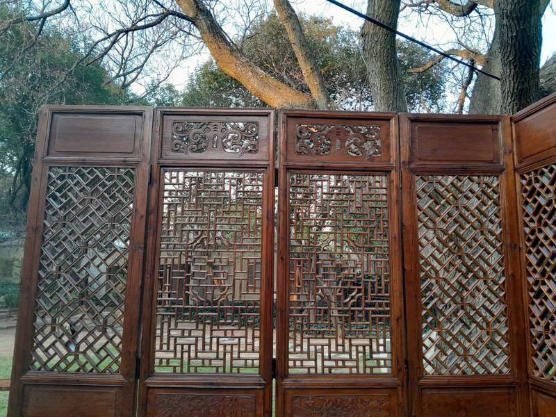 A First Half 20th Century Pair Of Double Chinese Elmwood Screen Panels (Two pairs available)