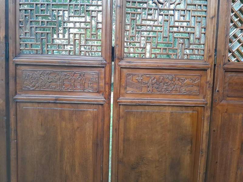 A First Half 20th Century Pair Of Double Chinese Elmwood Screen Panels (Two pairs available)