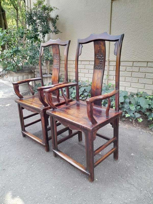 A 20th Century Pair of Chinese Elm Yoke Meditation Chairs