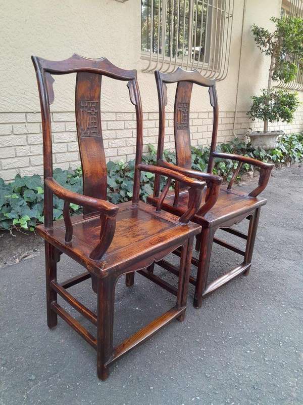 A 20th Century Pair of Chinese Elm Yoke Meditation Chairs